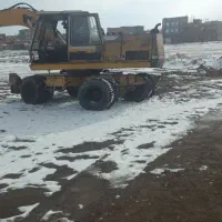 بیل ۹۱۲ لاستیکی درجه یک معاوضه دارم ملک مشهد