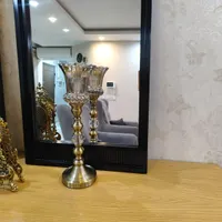 آینه ها و دوتا شمعدان