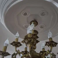 ۴ عدد لوستر برنزی یک شکل و وسایل دیگر همه برنزی