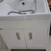 روشویی و کابینت و شیر سرویس بهداشتی