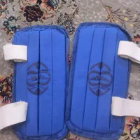 ساق بند و کلاه تکواندو و لباس هندبال