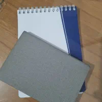 خودکار و دفترچه یاداشت