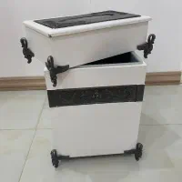 سطل و جادستمالی چوبی.