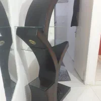 یک عدد استند دکوری|کتابخانه، شلف، قفسههای دیواری|بومهن, |دیوار