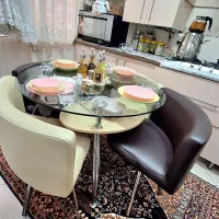 میز ناهار خوری 4نفره کمجا 2طبقه چرم پایه فلز چرخان