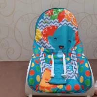 صندلی و نینی‌لای لای موزیکال چند کاره