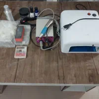 دستگاه کاشت ناخن|آرایشگاه و سالن‌های زیبایی|اردبیل, |دیوار