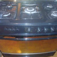اجاق گاز فردار برند تکنو دو جوجه گردان درحد نو