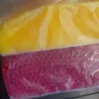 مقداری ظروف یکبارمصرف قاشق بستنی چنگال نی