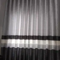 دوعدد پرده تازه دوخت شده