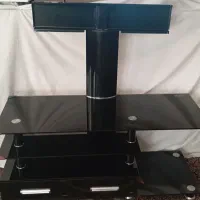 میز تلویزیون شیشه ای در حد نو