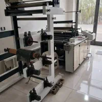 یک دستگاه دوخت برشی و یک دستگاه رول کن سه کاره