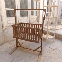 گهواره با چوب روس