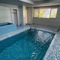 اقامتگاه چوبینه واحد استخر دار جنگلی