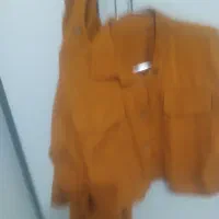 کت گوتاه بادامن رنگ اجری هست