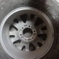 یک حلقه لاستیک و رینگ آمیکو آسناد