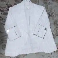 تعدادی کت زنانه|لباس|ساری, |دیوار