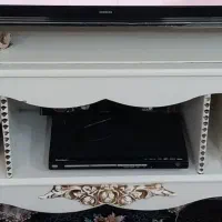 ساعت ،میزتلویزیون،ست جادستمالی و سطل زباله و بوفه