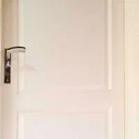 درب چوبی همراه چهارچوب فلزی