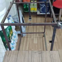 تعدادی وسایل ساندویچی|کولر آبی|رباط‌کریم, رباط‌کریم|دیوار