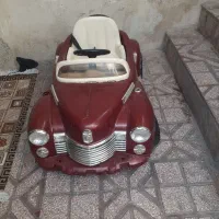 دوعددماشین شارژی یکی دوموتور ویکی تک موتور|اسباب‌بازی بچه|رباط‌کریم, رباط‌کریم|دیوار