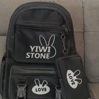 کیف مدرسه|کیف، کفش، کمربند|قم, بنیاد|دیوار