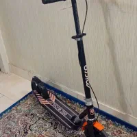 اسکوتر همراه کارتن