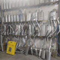 تعویض اگزوز به قیمت درب کارخانه