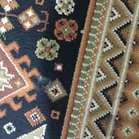 گلیم6متری دوتازده سوختگی کوچک داره