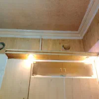 کابینت فلزی بالای ظرف شور