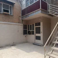 یک باب منزل مسکونی دو طبقه مجزا با حیاط و پارکینگ