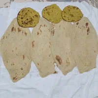 نان محلی با آرد گندم با آتیش چوب وتافتون