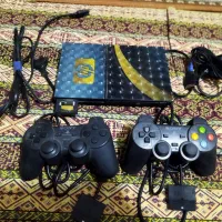 ps2 و یا پلی استیشن ۲، در حد نو با دو دسته.