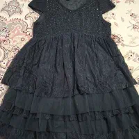 تعدادی لباس در حد نو