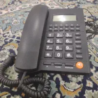 تلفن ثابت تمیز و کم کارکرد