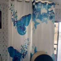 پرده تصویر طرح پروانه آبی