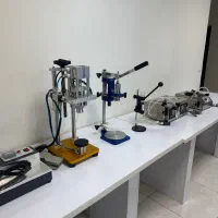 دستگاه پرکن پرس سلفون ادکلن طوق زن کریمپر (درب بند