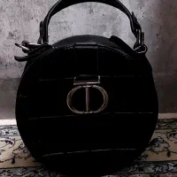 کیف|کیف، کفش، کمربند|اصفهان, باغ فدک|دیوار