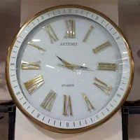 ساعت دیواری آرتمیس اعدادیونانی طلایی سفید