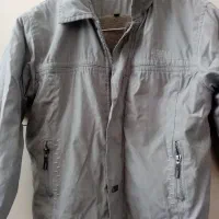 کاپشن گرم  پسرانه 8 تا 10 ساله  زیبا در حد نو