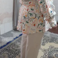 یک عدد مانتو شلوار نو فقط یک بار تن شده