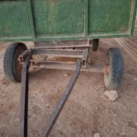 تریلی تراکتور چهارچرخ و یک دستگاه پشت تراکتور