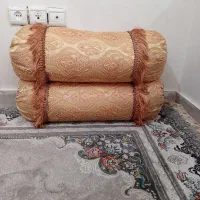 متکای گرد پر