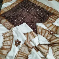 روی تختی وتخت خواب دونفره به همراه خوشخواب ودوپایه