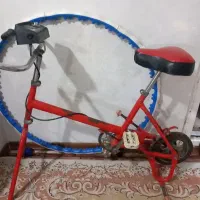 دوچرخه ثابت همراه با حلقه کمر
