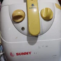 سرخ کن و ظرف سفالی