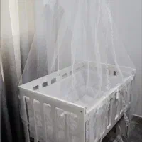 تخت خواب گهواره ای کنار تخت مادر