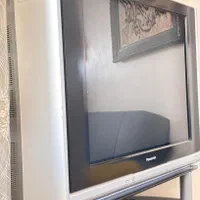 تلویزیون پاناسونیک به همراه میز شیشه ای