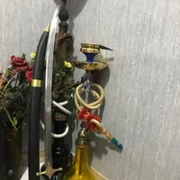 دوعدد قلیون با یک عدد شمشیر اهن بر