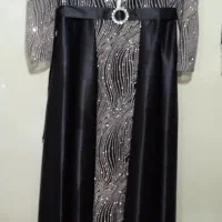 چند تا پیراهن مجلسی زنانه و دخترانه ‌. پالتو۴۴